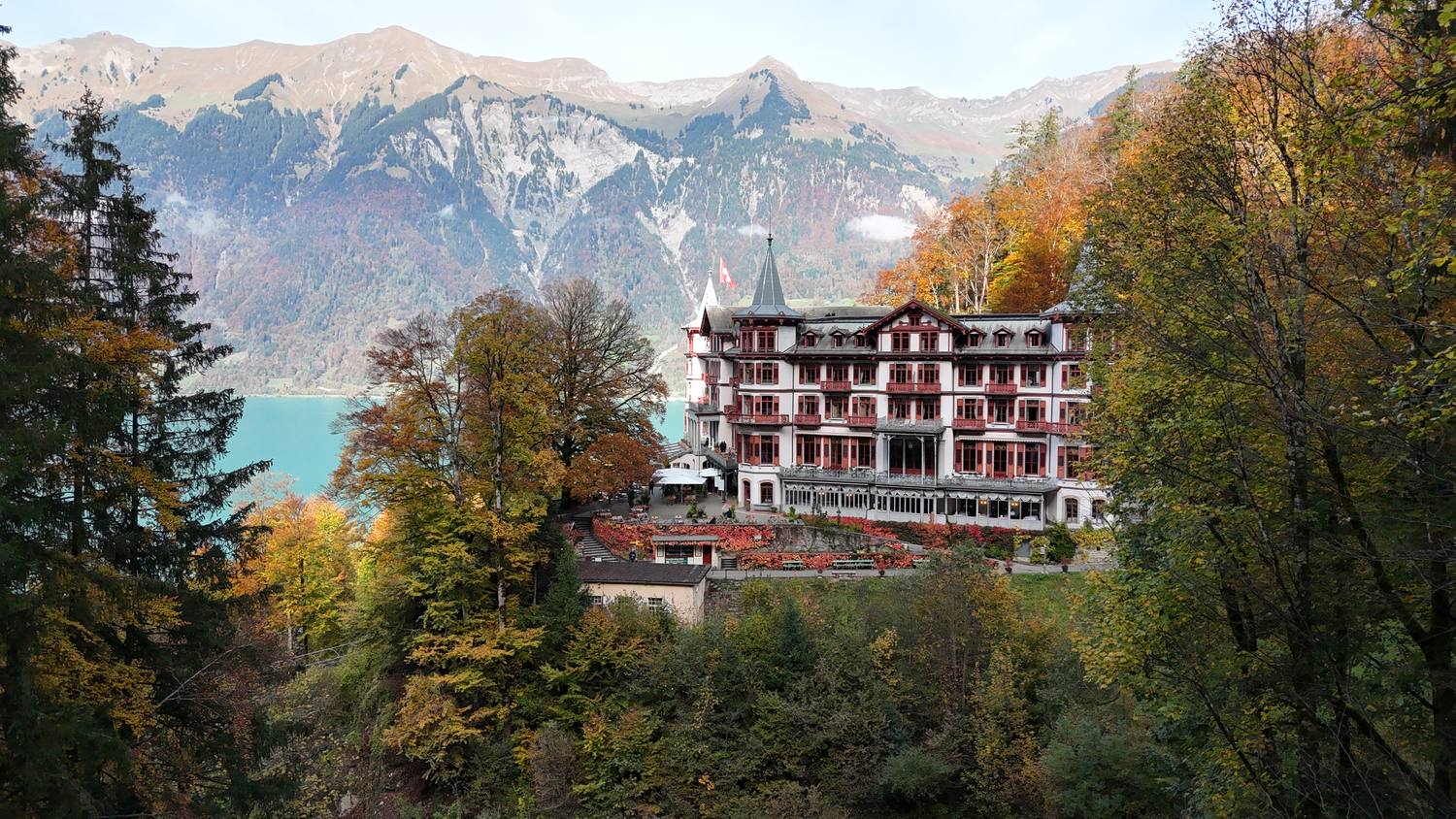 The Grandhotel Giessbach above Lake Brienz, framed by autumn trees