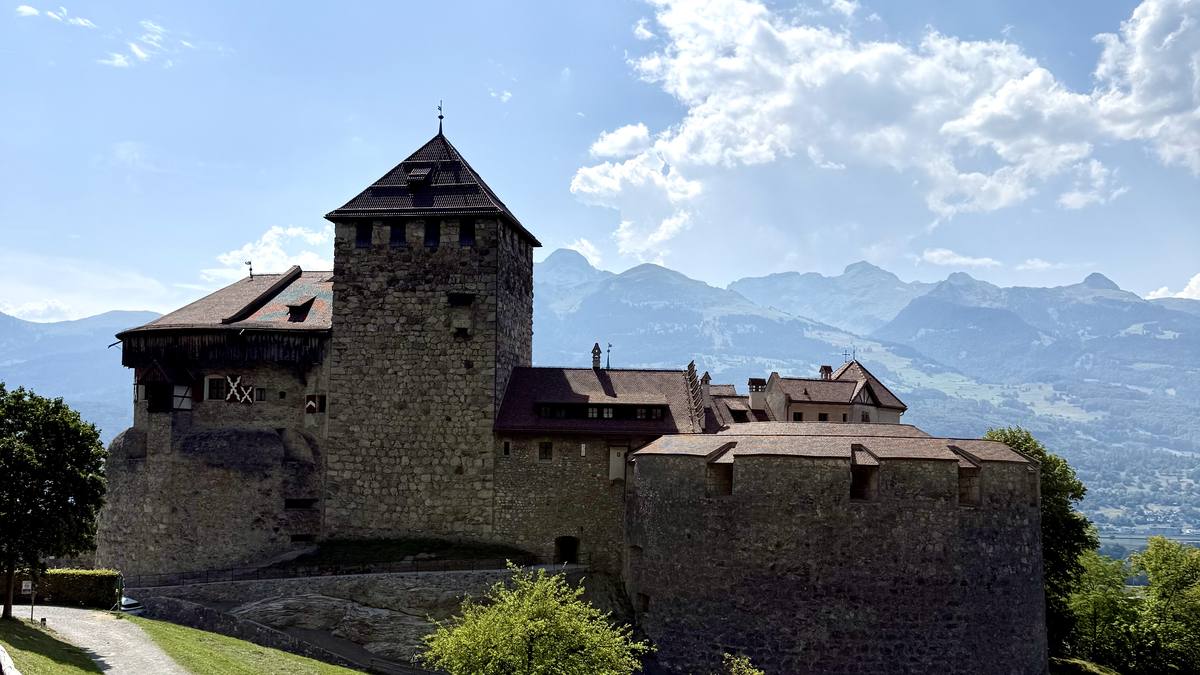 Schloss Vaduz on its rock above the Rhine valley, with the Raetikon range behind it