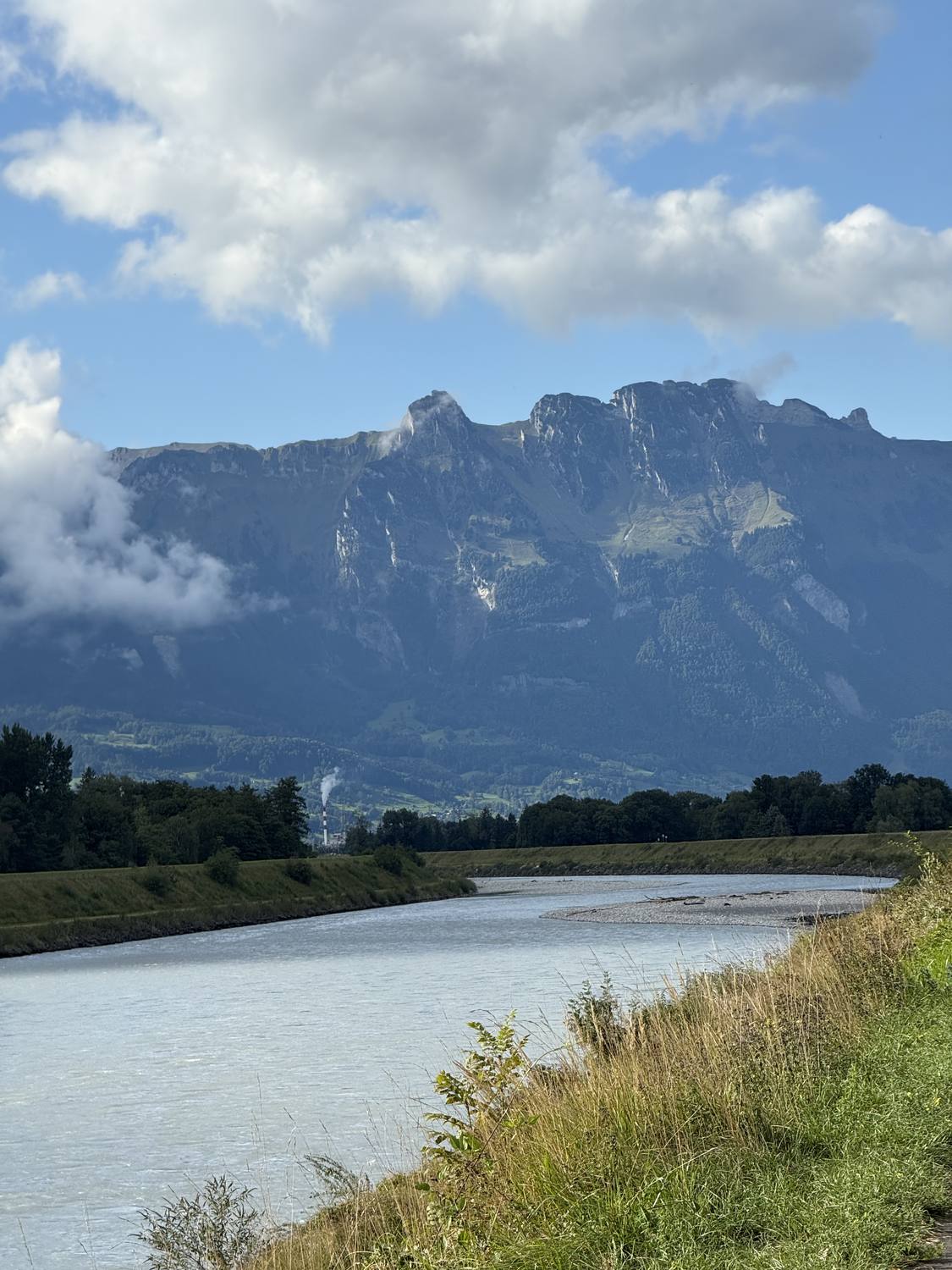 The young Rhine flowing past the vineyards of the valley below the Raetikon