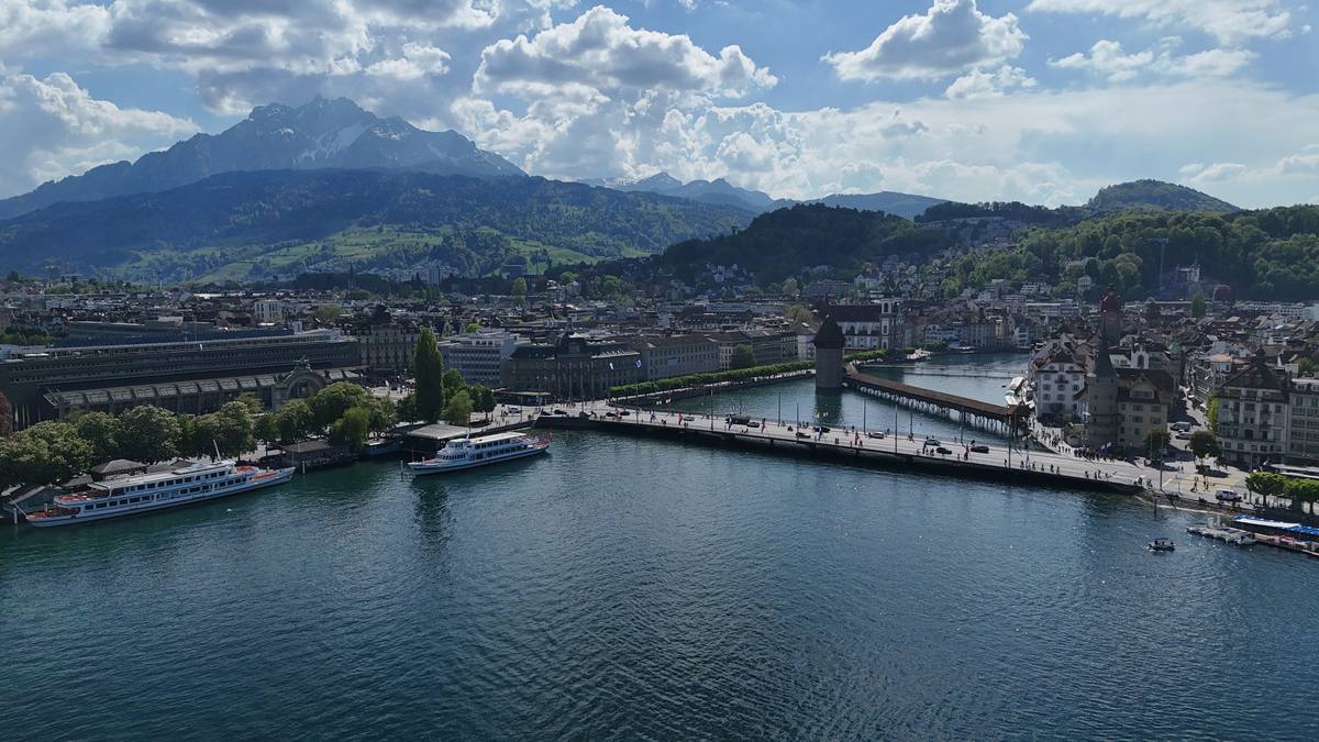 Lucerne from above with the lake, the Chapel Bridge and Mount Pilatus behind