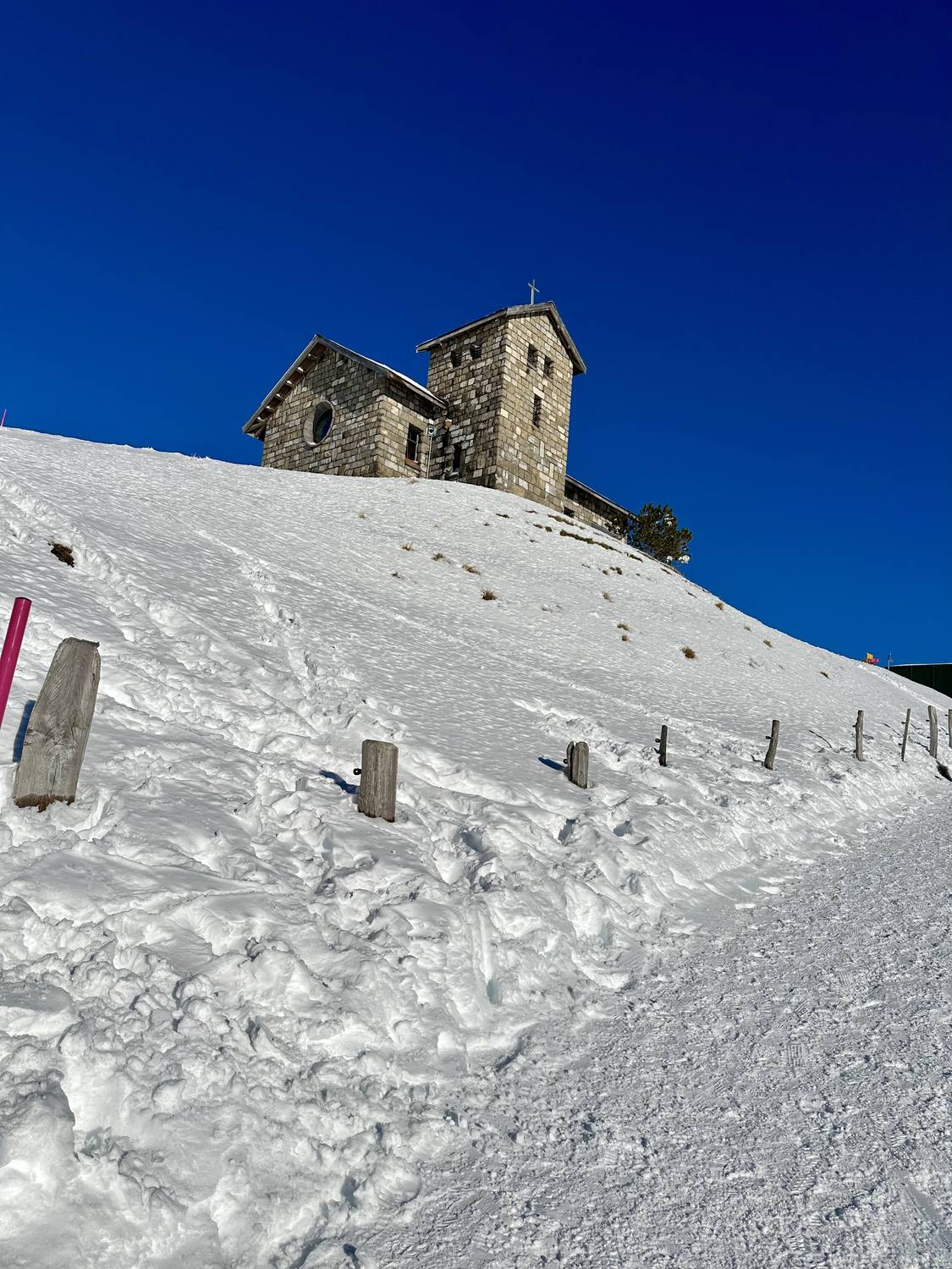 The small stone chapel on Rigi Kulm above Lake Lucerne, standing in deep snow