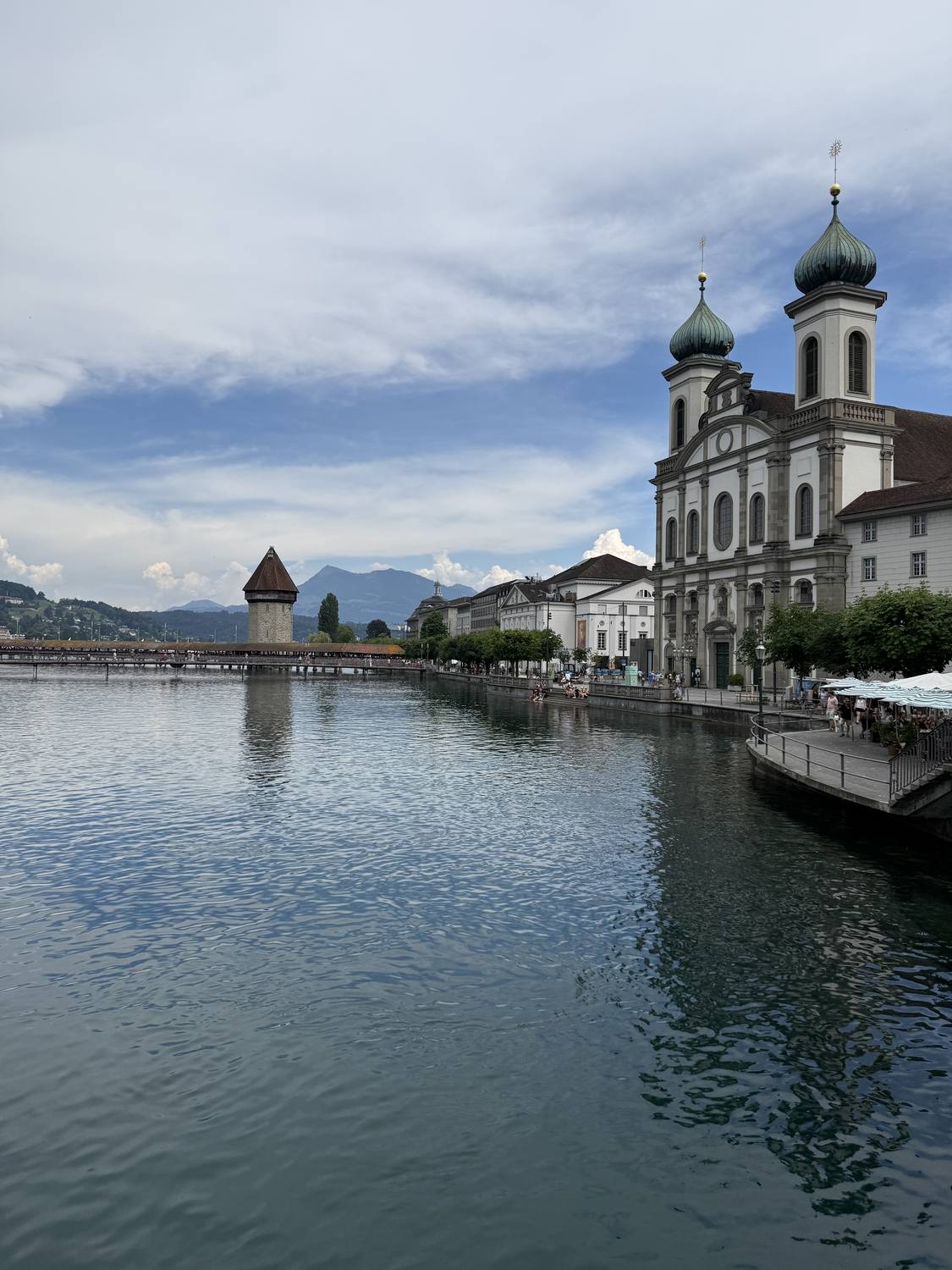 The twin domes of the Jesuit Church in Lucerne, with the Water Tower and Chapel Bridge beyond