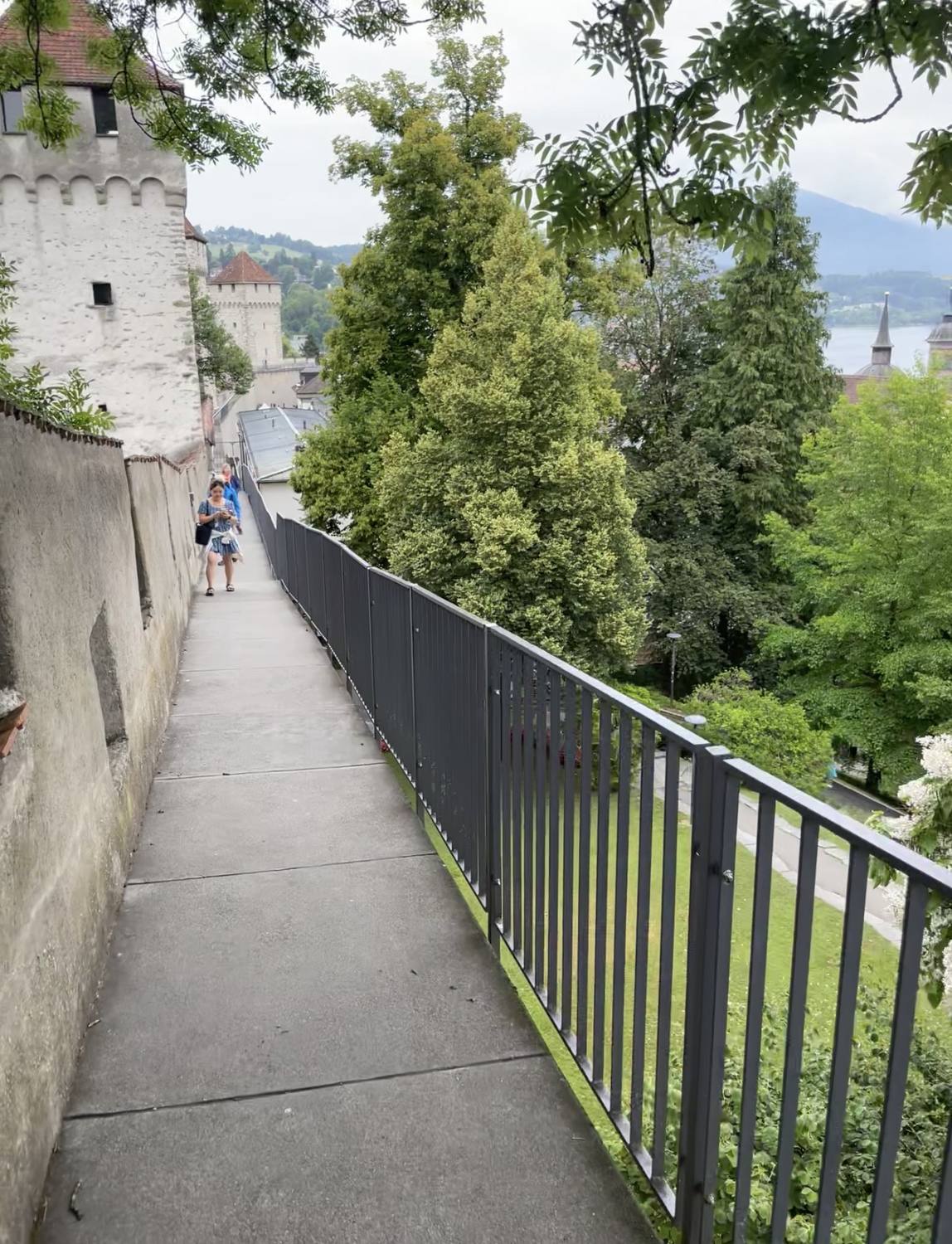 The walkway along the Musegg Wall in Lucerne, one of its towers ahead