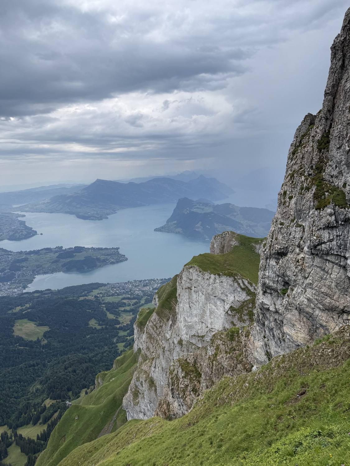 The cliffs of Mount Pilatus dropping away to Lake Lucerne far below
