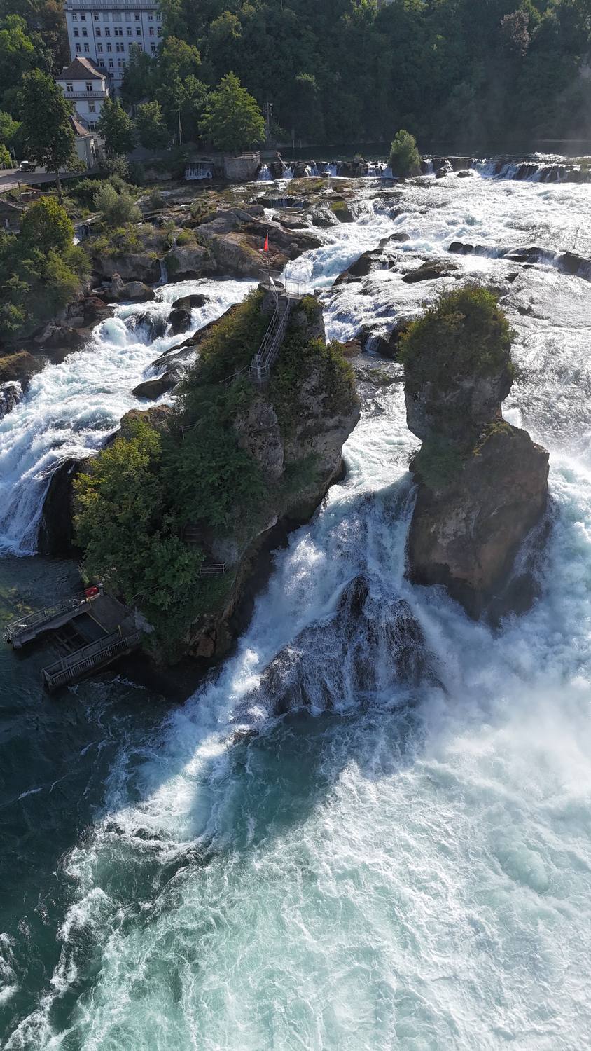 The Rhine Falls from directly above, the central rock splitting the white water