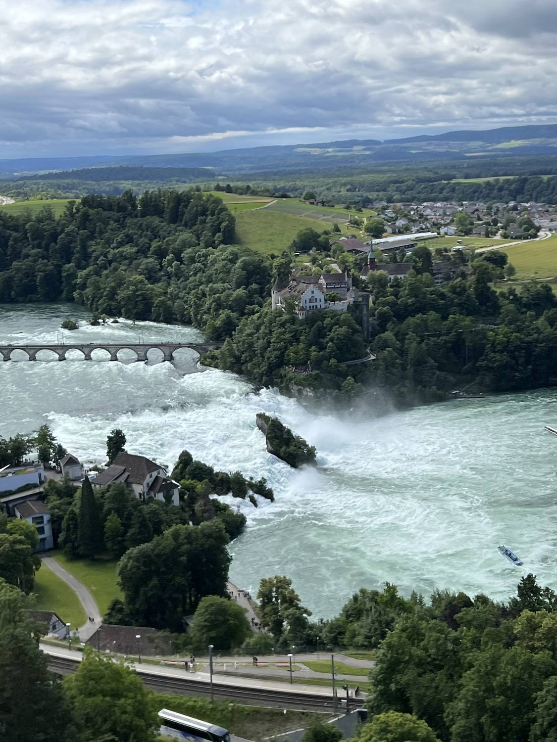 The Rhine Falls from the Schloss Laufen viewpoint, the river opening out below