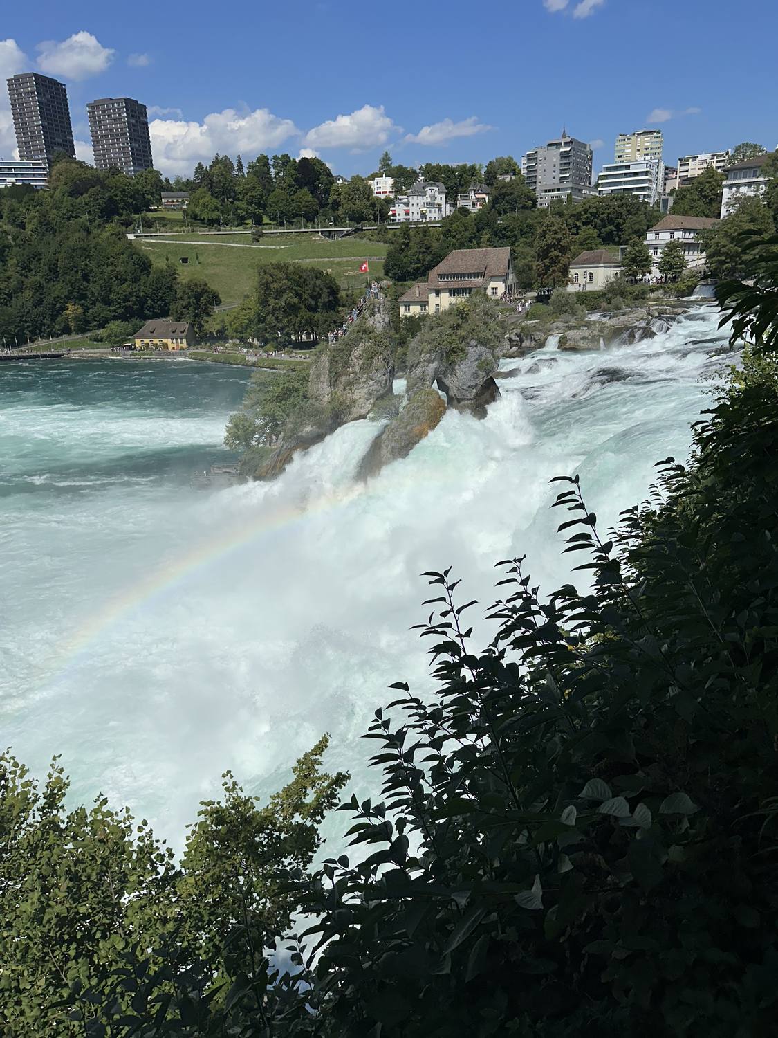 A rainbow standing in the spray of the Rhine Falls