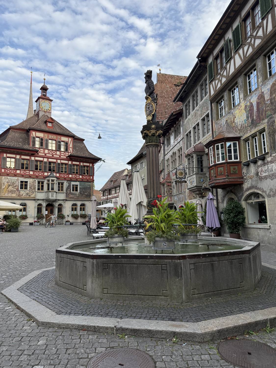The fountain on the town hall square of Stein am Rhein, framed by painted facades