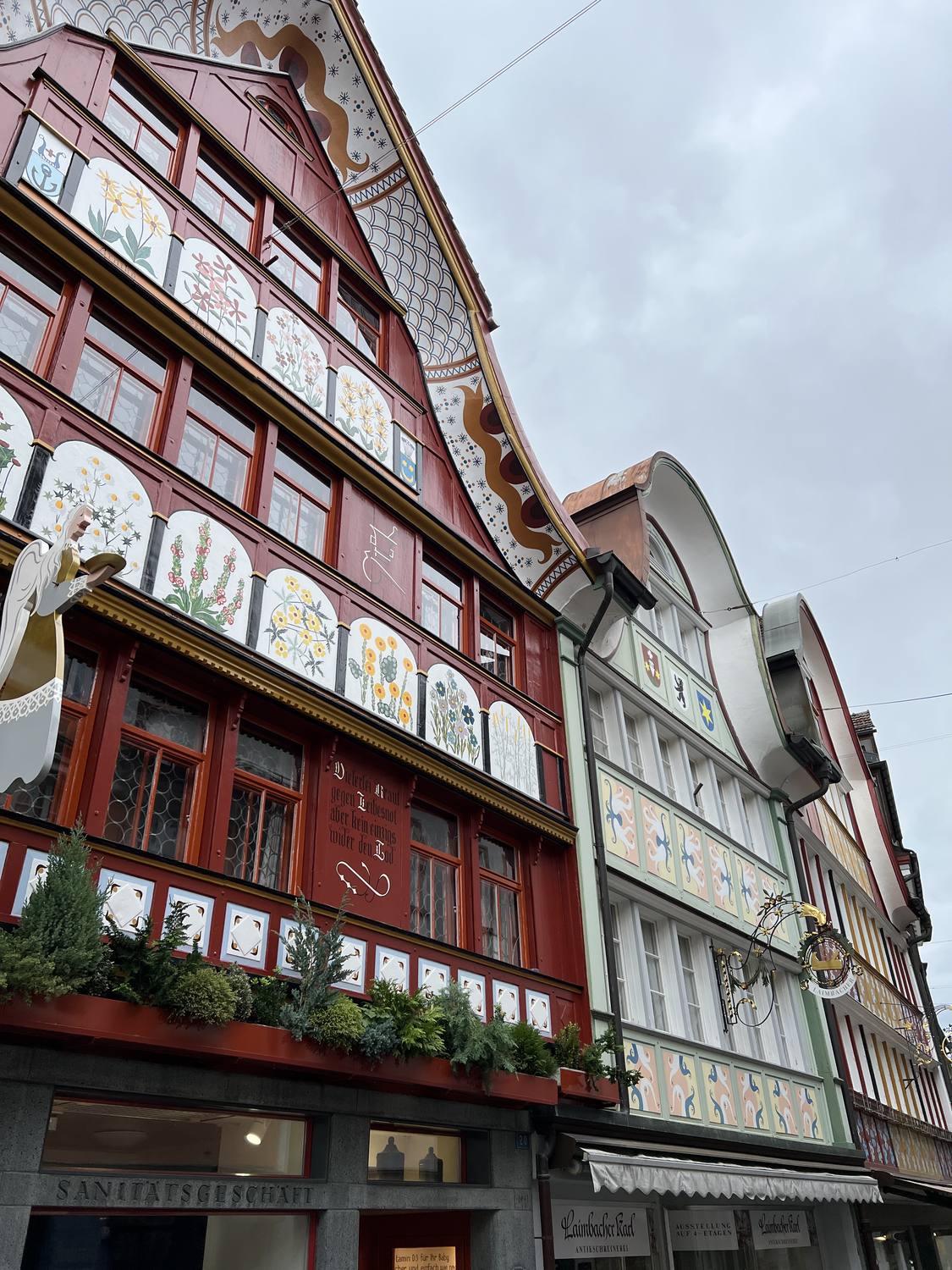 The painted house fronts of Appenzell, decorated with flowers and figures