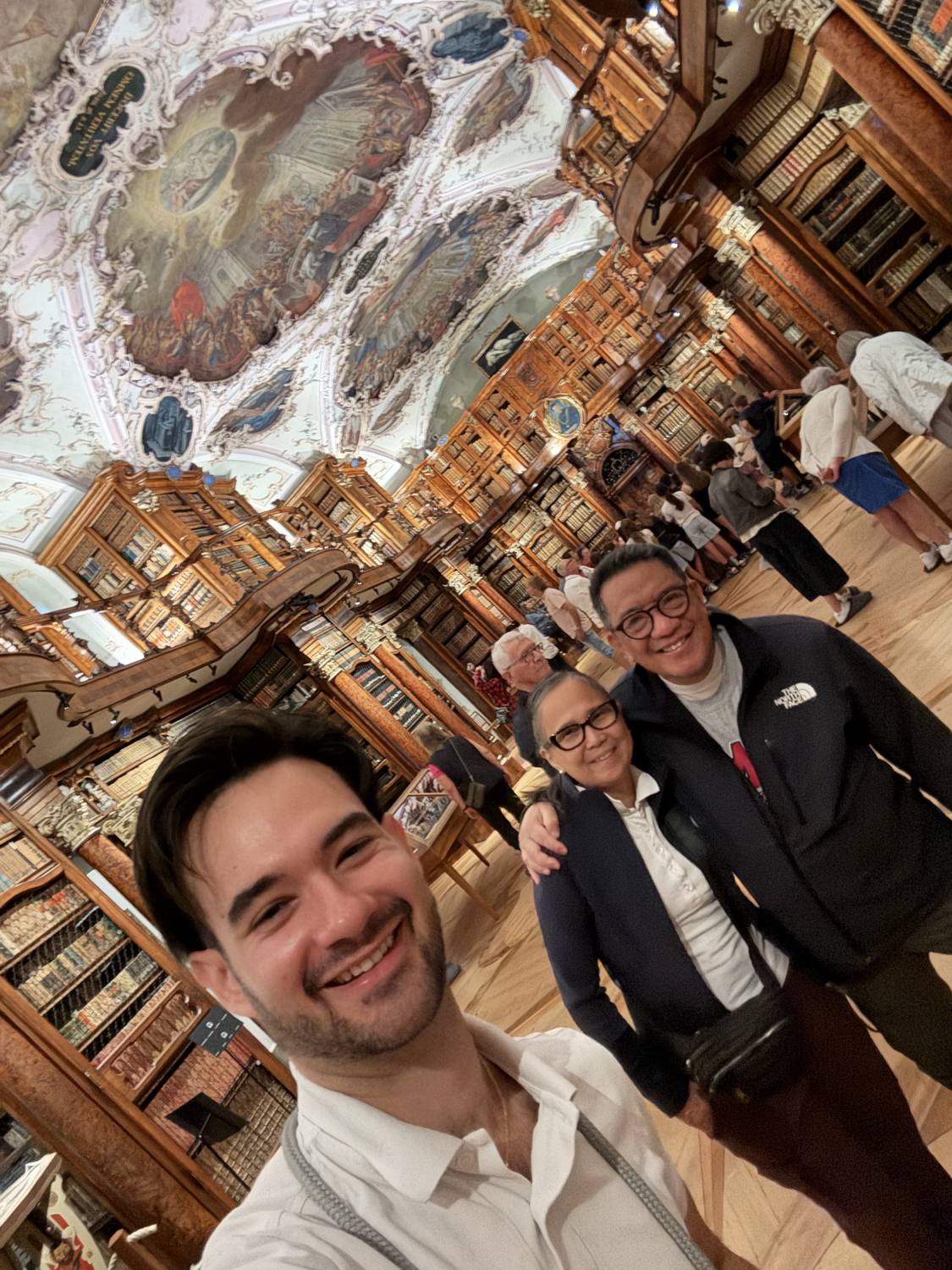 Guests and their guide inside the Abbey Library of St. Gallen