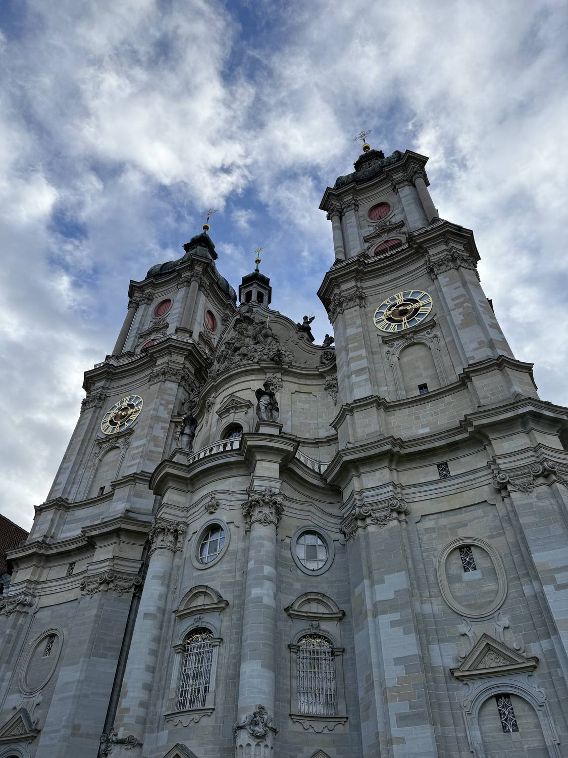 The baroque west front of St. Gallen Cathedral with its two clock towers
