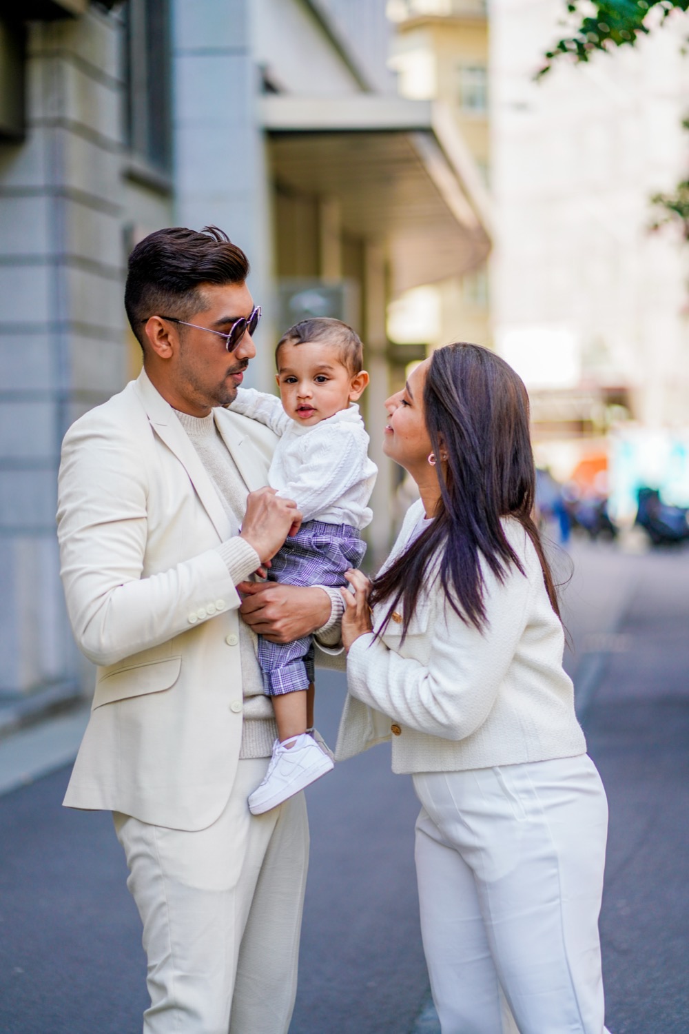A family walking along Bahnhofstrasse, Zurich's main shopping street