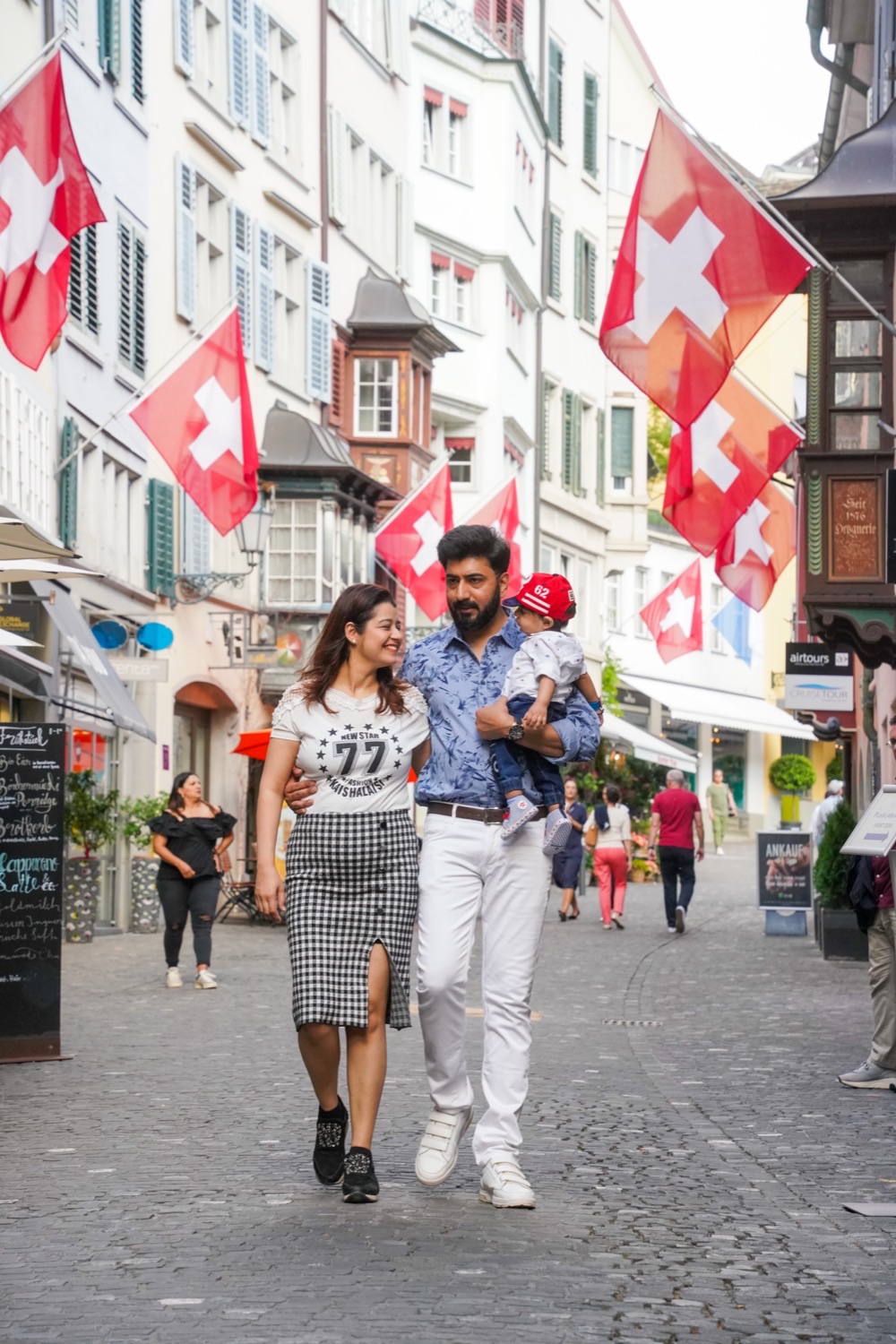 A family on Rennweg, one of Zurich's old town streets