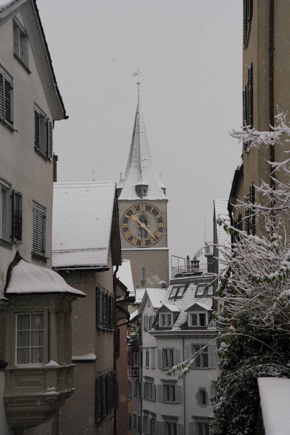 St. Peter's Church tower in Zurich's old town, seen in winter